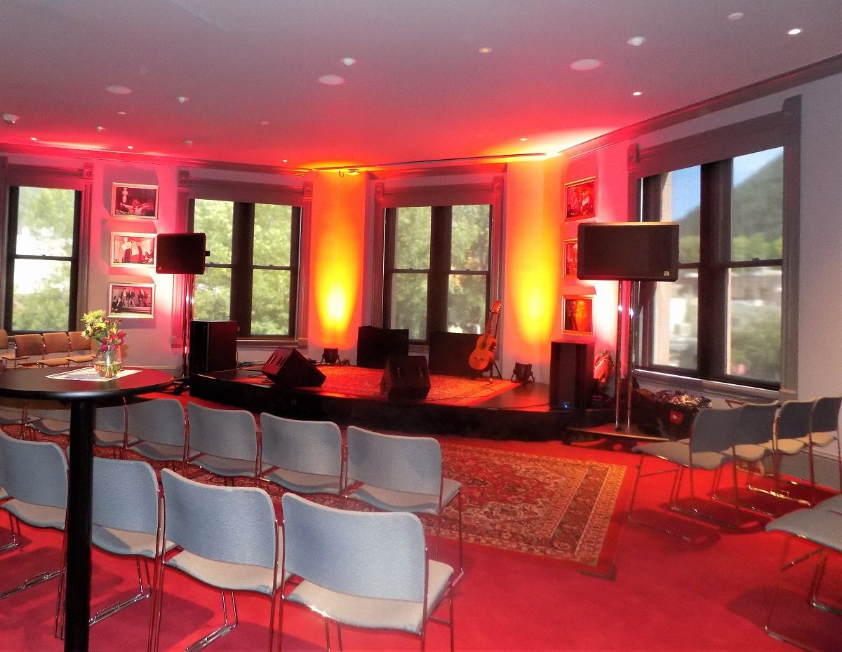 Wheeler bar lobby with stage and chairs