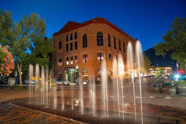 Wheeler building night with fountains